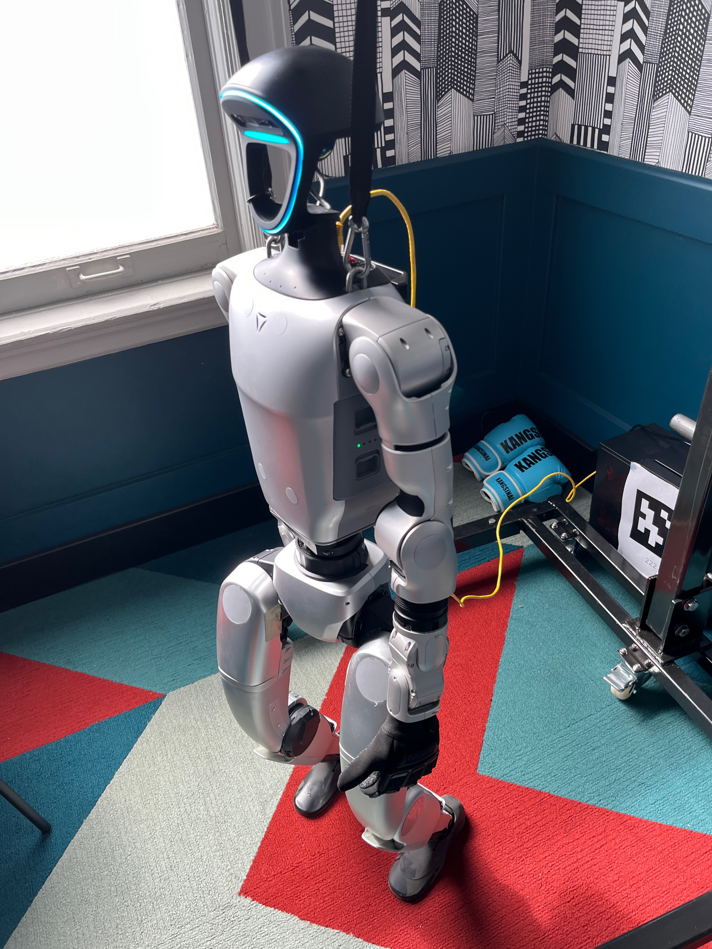 Unitree G1 humanoid robot in our Frontier Tower office environment